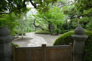 View over a gate into Happo-en Garden Tokyo