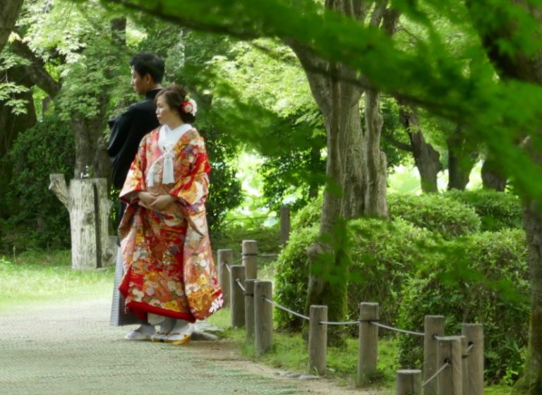 bride-and-groom-in-pond-area-of-kyoto-botanical-gardens